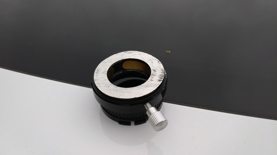 Adaptateur 2" 1.25", raccourci de 16mm, 3 taraudages M4 à 120°, 3 vis fixent le bouchon de l'objectif à cet adaptateur, bouchon percé à 32mm